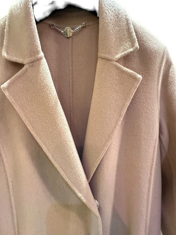 Close-up of Marccain Wheat Long Coat featuring soft wool-cashmere blend and classic lapel design.