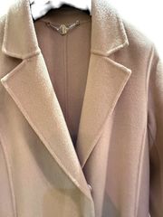 Close-up of Marccain Wheat Long Coat featuring soft wool-cashmere blend and classic lapel design.