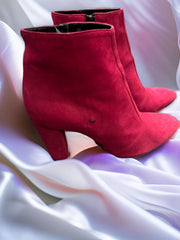 Marrccain Burgundy Suede Ankle Boots on satin background for stylish winter outfits.