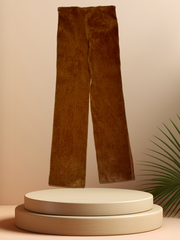 Marccain brown corduroy straight pants displayed on a pedestal, showcasing stylish fabric and polished fit.
