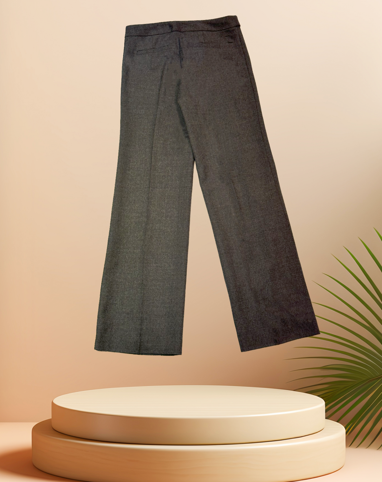Michael Kors gray straight pants showcased on a pedestal, highlighting a flattering fit and stylish silhouette.