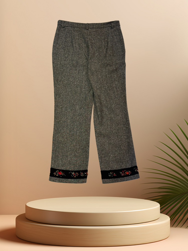 Marccain Gray Flower Ring Straight Pants with elegant flower pattern, made from wool and cashmere, displayed on a pedestal.