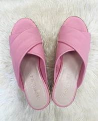 Marccain leather platform flip flops in pink with a stylish cross-over design, perfect for summer outfits.