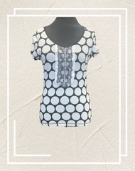 Ambiente B&W Polka Dot Blouse featuring a chic polka dot pattern, comfortable cotton blend, stylish short sleeves.