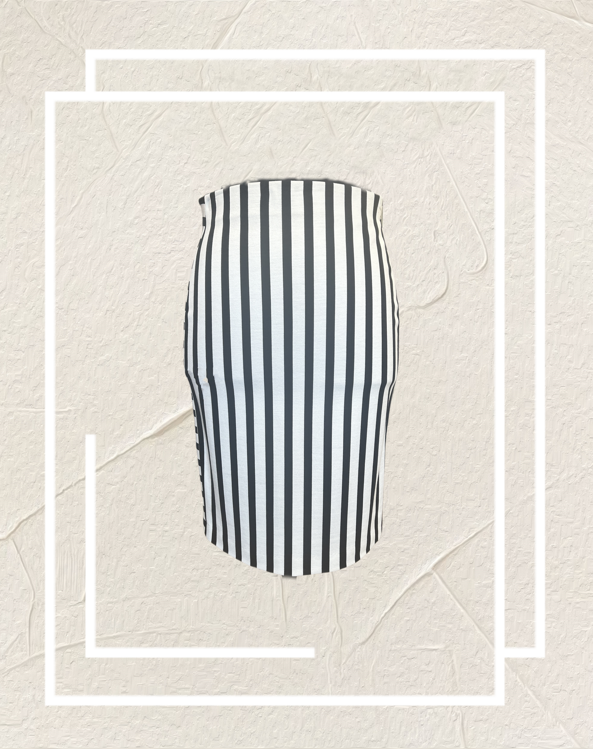 Marccain Striped Pencil Skirt featuring black and white stripes, flattering fit, and soft cotton blend, ideal for versatile looks.