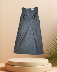 Elegant black summer dress by Michael Kors, featuring floral lace design and flattering A-line silhouette.