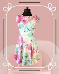 Versace Summer Floral Dress featuring a colorful floral print and a circular skirt, perfect for summer elegance.