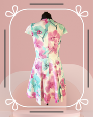 Versace Summer Floral Dress featuring a circular skirt and vibrant floral design, perfect for elegant summer wear.