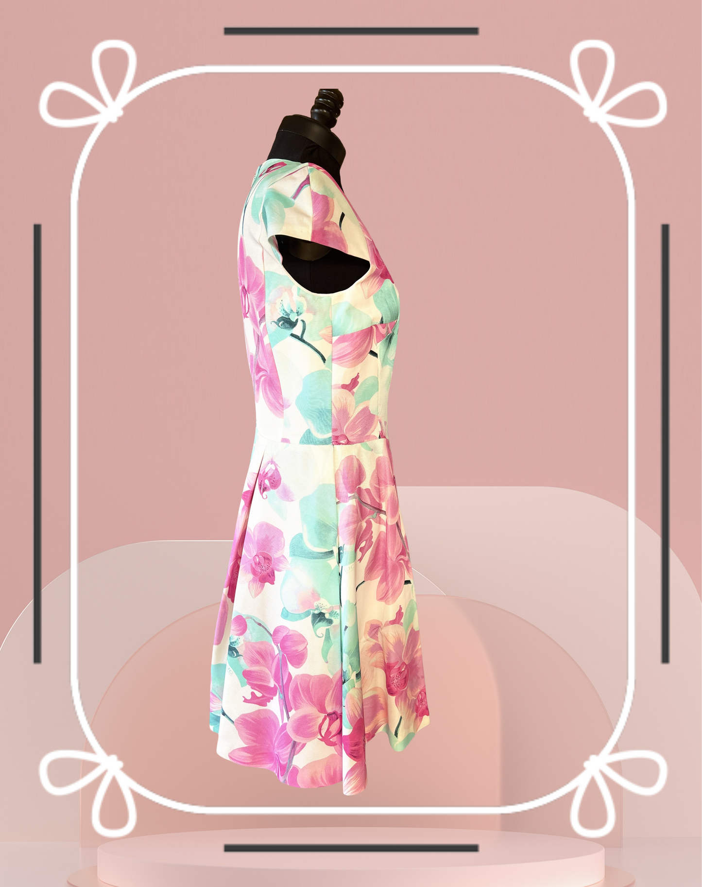 Versace Summer Floral Dress showcasing a side view with vibrant floral print on a dress form.