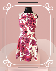 Elegant Versace white and red floral dress ideal for summer events, showcasing beautiful floral print and chic design.