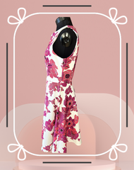 Versace white and red floral dress showcased on a mannequin, perfect for summer occasions.