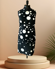 Versace B & W Polka Dot Dress featuring a low back cut, bold polka dot pattern, and summer styling on a mannequin.