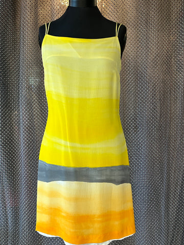 Laurel Silk Dress in a sunset gradient of yellow, gray, and orange perfect for summer style and comfort.