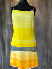 Laurel Silk Dress in a sunset gradient of yellow, gray, and orange perfect for summer style and comfort.