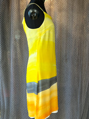 Laurel Silk Dress featuring a vibrant yellow sunset gradient, perfect for summer fashion.