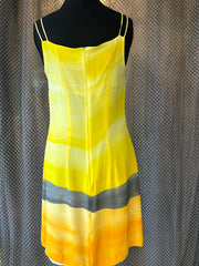 Laurel Silk Dress featuring a vibrant yellow and gray sunset gradient, perfect for summer outfits.
