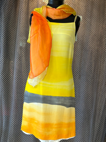 Laurel Silk Dress in sunset gradient yellow with matching orange scarf, perfect for summer styling and comfort.