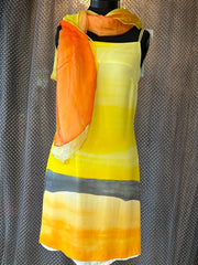 Laurel Silk Dress in sunset gradient yellow with matching orange scarf, perfect for summer styling and comfort.