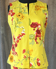 Derrico Yellow Floral Blouse with sleeveless design, floral pattern, and split neckline, perfect for summer style.