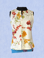 Derrico White Floral Blouse featuring a vibrant floral pattern, perfect for stylish and comfortable wear on any occasion.