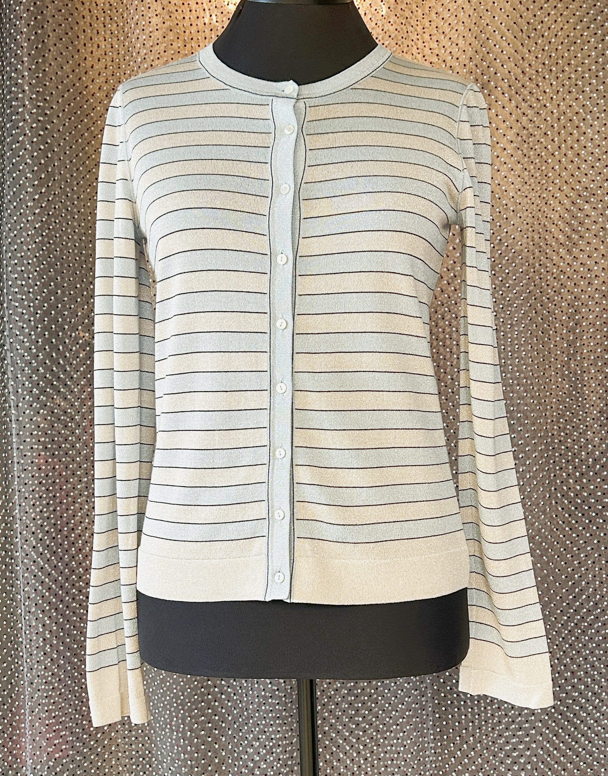 Marccain Stripped Cardigan in light blue and cream, featuring button closure and elegant striped design for versatile styling.