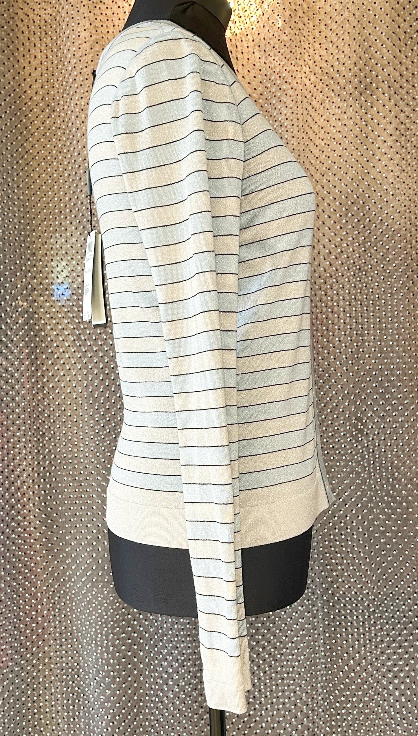 Side view of Marccain Stripped Cardigan, featuring silver thread accents in a stylish design. Perfect for layering and elegant outfits.
