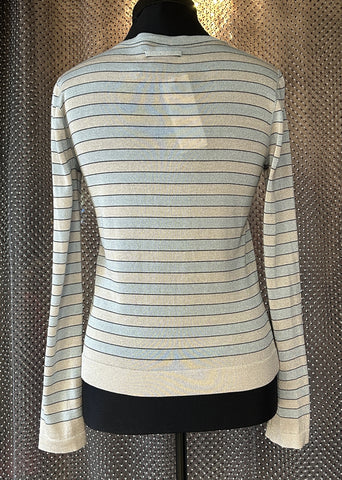 Back view of Marccain stripped cardigan showcasing elegant silver and blue stripes, perfect for layering or casual outfits.