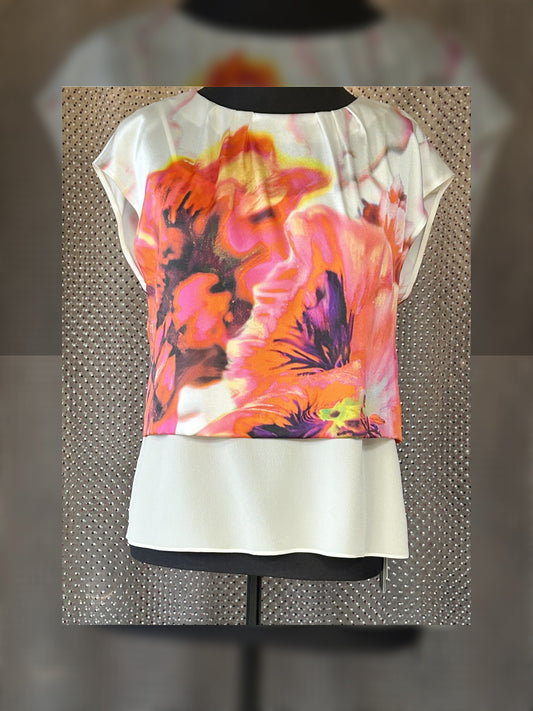 Marccain silk blouse with floral print in vibrant colors, featuring a luxurious and versatile design for any outfit.
