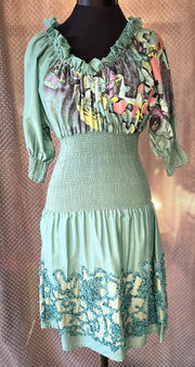 Save The Queen green dress featuring unique prints and elegant details, perfect for a stylish wardrobe upgrade.