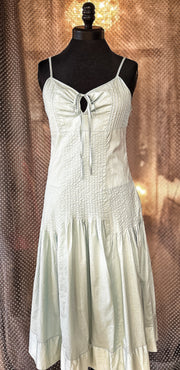 Essentiel Turquoise Summer Dress featuring a classic cut, made of 100% cotton for comfort and style.