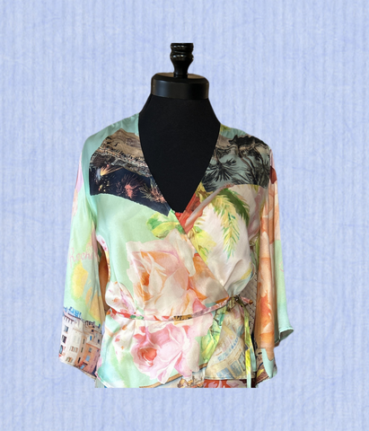 Gerard Darel Silk Cardigan featuring a colorful floral print, perfect for elevating any wardrobe with sophistication.