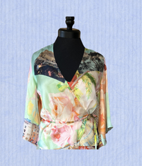 Gerard Darel Silk Cardigan featuring a colorful floral print, perfect for elevating any wardrobe with sophistication.
