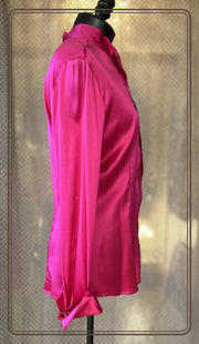Versace Silk Hard Pink Shirt displayed sideways, showcasing luxurious silk fabric and elegant design details.
