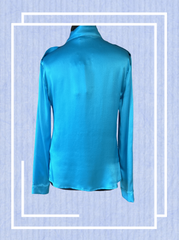 Back view of a luxurious Versace silk shirt in vibrant blue, featuring a classic cut for ultimate elegance.