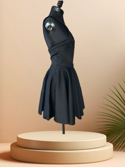 Versace black dress on a mannequin showcasing its elegant silhouette and circular skirt design.