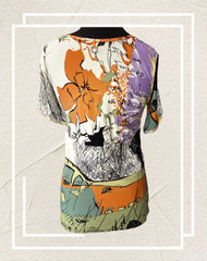 Save the Queen Blouse featuring a unique abstract print, showcasing vibrant colors and a modern design.