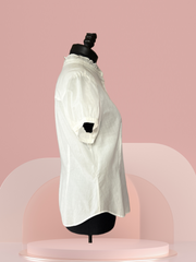 Escada Cotton Blouse displayed on a mannequin; features a classic cut and puff sleeves, perfect for summer style.