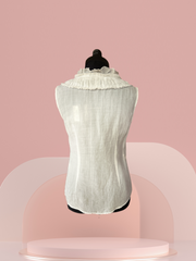 Back view of the Seventy Cotton Vest, a lightweight 100% linen summer top, perfect for warm weather outfits.