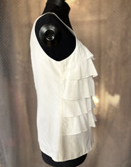 Marccain white blouse featuring a tiered design, made from a blend of cotton and silk, ideal for summer wear.