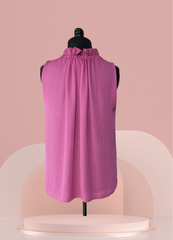 Marccain sleeveless blouse in hard pink, featuring an A-line fit and anti-wrinkle material for a polished look.