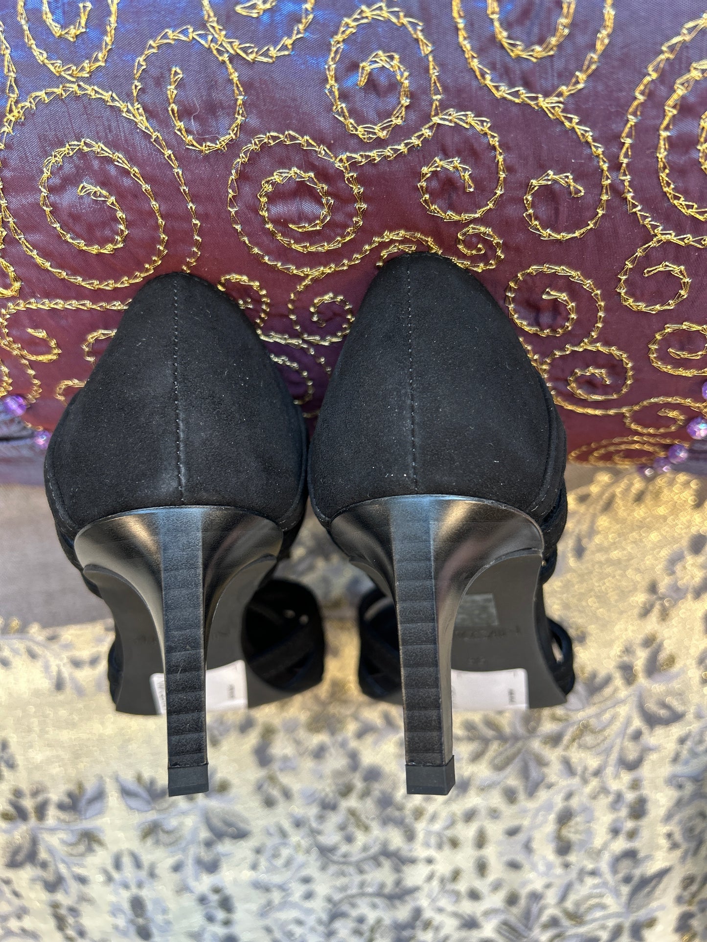 Top view of Marccain black suede heels showcasing elegant design and sleek heels, perfect for versatile styling.