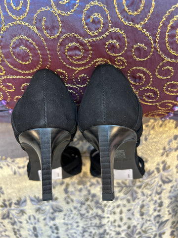 Top view of Marccain black suede heels showcasing elegant design and sleek heels, perfect for versatile styling.