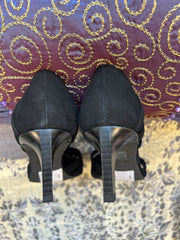 Top view of Marccain black suede heels showcasing elegant design and sleek heels, perfect for versatile styling.