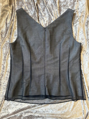 Laurel Vest in gray wool with black net outer shell and v-neck, showcasing elegant fitted design for style and warmth.