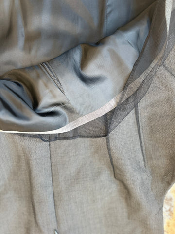 Inside view of the Laurel Vest showcasing the soft black net outer shell and wool lining for style and warmth.