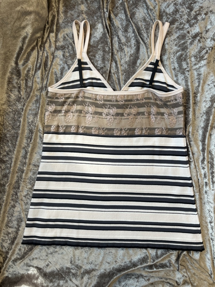 Marccain spaghetti strap vest featuring a stylish striped pattern and delicate lace detail for a feminine touch.