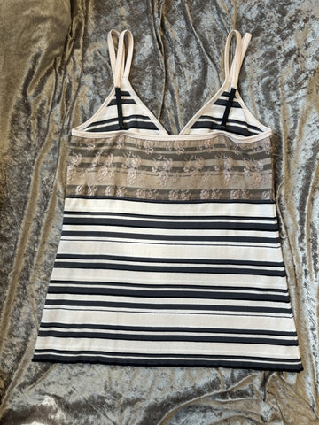 Marccain spaghetti strap vest featuring a stylish striped pattern and delicate lace detail for a feminine touch.