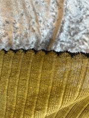 Marccain Spaghetti Strap Vest close-up showing scalloped hem design on a textured background.