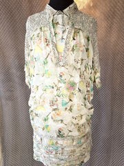 Elegant Marccain silk skirt featuring a layered design with floral patterns, perfect for stylish outfits.