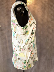 Marccain Oriented Fan Print Blouse side view showcasing its stylish design and vibrant fan print on breathable fabric.